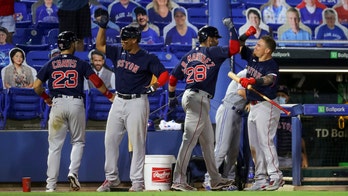 Martinez's 2-run homer in 9th lifts Red Sox over Jays 8-7