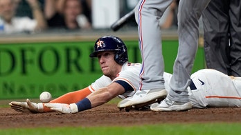 Straw scores on wild pitch in 11th, Astros beat Rangers 4-3