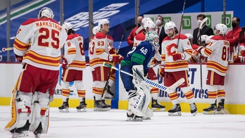 Lindholm's OT goal lifts Flames past Canucks 6-5