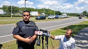 Man killed in shooting at Orlando U.S. immigration building; suspect in custody