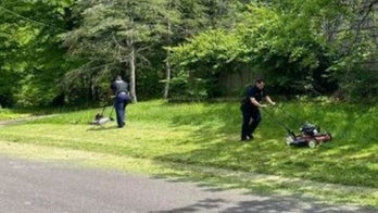 Kansas police officers mow lawn for elderly widower between service calls