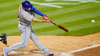 Alonso, Mets top Phillies 8-7 after replay reversal