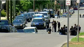 Four Alabama officers hurt after argument over dog ends in deadly shooting