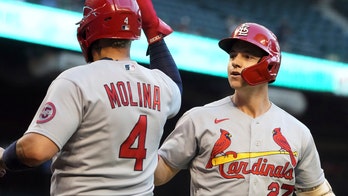 Molina's double in 10th leads Cards past skidding D-backs