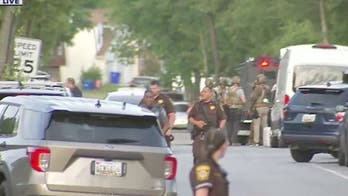 Maryland officers shot in 'ambush' while serving arrest warrant