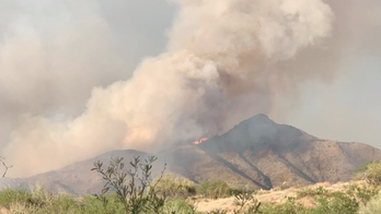 Arizona inmates battle raging wildfires