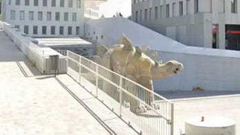 Missing man's body recovered inside dinosaur statue, may have gotten stuck retrieving cellphone: report