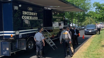 Virginia police name suspect after military couple shot dead in cold blood outside their home