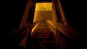 Homeowner finds secret staircase in house behind boarded up door