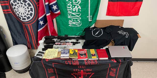 A search warrant was executed at Blevins' residence in the 200 block of Spence Street for seizure of firearms, ammunition, electronic evidence, concentrated THC, and radical ideology paraphernalia, including books, flags, and handwritten documents. (Photo courtesy of Kerr County Sheriff's Office)