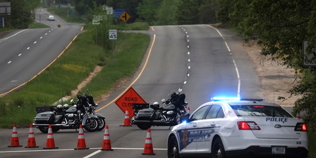 Dolley Madison Boulevard is blocked off by law enforcement in response to a security-related situation outside of the secure perimeter near the main gate of CIA headquarters in Virginia, U.S. May 3, 2021. REUTERS/Leah Millis