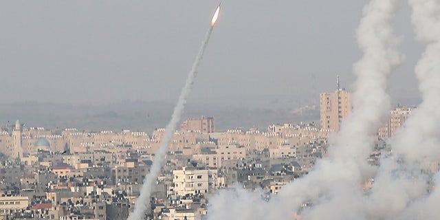 Rockets are launched by Palestinian militants into Israel, in Gaza May 10, 2021. REUTERS/Mohammed Salem