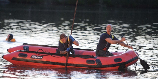 Emergency crews search for two boys who drowned at Waldo Lake at D.W. Field Park in Brockton on Saturday, May 15, 2021. (Marc Vasconcellos-USA TODAY NETWORK)