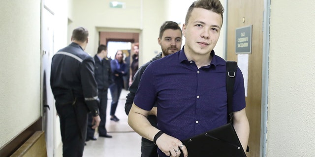 Opposition blogger and activist Roman Protasevich, who is accused of participating in an unsanctioned protest at the Kuropaty preserve, arrives for a court hearing in Minsk, Belarus April 10, 2017. 