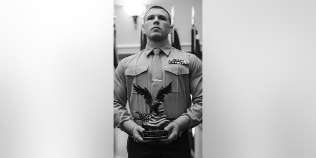 U.S. Marine Staff Sgt. John W. Stefanowicz, with Marine Corps Base Camp Lejeune, N.C., is awarded and recognized as the Athlete of the Year for the United States Marine Corps Wrestling Team at the Commandant of the Marine Corps Combined Awards Ceremony at The Clubs at Quantico, Marine Corps Base Quantico, Va., Jan. 22, 2020. This ceremony originated in 1995 recognizing top recruiters, instructors, and the command with the highest combined physical and combat fitness performance. (U.S. Marine Corps by photo Cpl. Mikayla R. Perez)