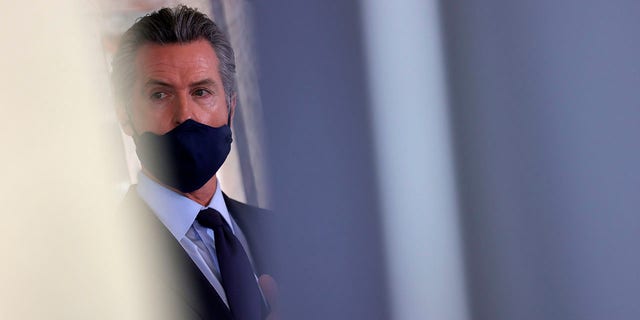 California Governor Gavin Newsom looks on during a press conference at Unity Council on May 10, 2021 in Oakland, California. 