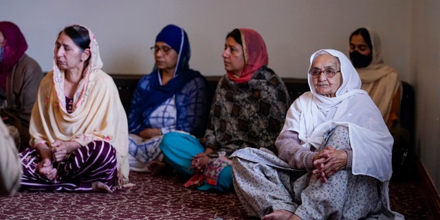 Members of the Sikh Coalition gather at the Sikh Satsang of Indianapolis in Indianapolis, Saturday, April 17, 2021 to formulate the groups response to the shooting at a FedEx facility in Indianapolis that claimed the lives of four members of the Sikh community. A gunman killed eight people and wounded several others before taking his own life in a late-night attack at a FedEx facility near the Indianapolis airport. (AP Photo/Michael Conroy)