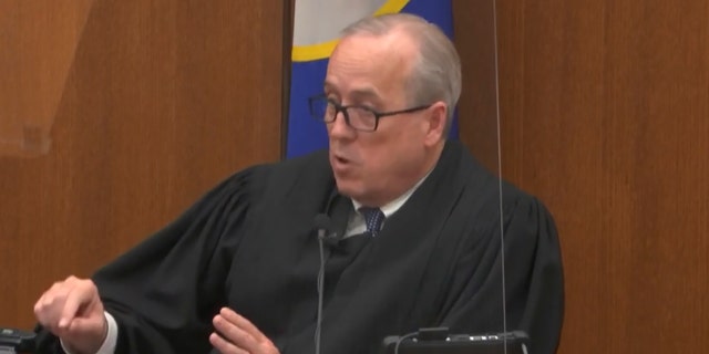 In this image from video, Hennepin County Judge Peter Cahill dresses the court after the judge put the trial into the hands of the jury. Monday, April 19, 2021, in the trial of Chauvin, in the May 25, 2020, death of George Floyd at the Hennepin County Courthouse in Minneapolis, Minn. (Court TV via AP, Pool)