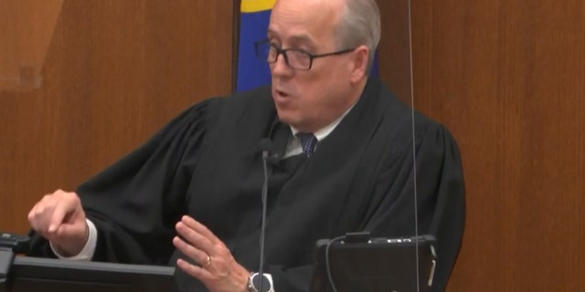 In this image from video, Hennepin County Judge Peter Cahill dresses the court after the judge put the trial into the hands of the jury. Monday, April 19, 2021, in the trial of Chauvin, in the May 25, 2020, death of George Floyd at the Hennepin County Courthouse in Minneapolis, Minn. (Court TV via AP, Pool)