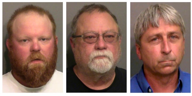 This combo of booking photos provided by the Glynn County, Ga., Detention Center, shows from left, Travis McMichael, his father Gregory McMichael, and William "Roddie" Bryan Jr.(Glynn County Detention Center via AP)