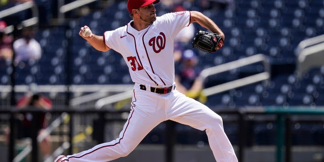 Washington Nationals starting pitcher Max Scherzer throws during the first inning of a baseball game against the Miami Marlins at Nationals Park, Sunday, May 2, 2021, in Washington. (AP Photo/Alex Brandon)