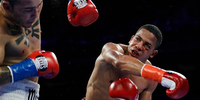 Puerto Rico's Felix Verdejo, right, punches Costa Rica's Bryan Vazquez during the fifth round of a lightweight boxing match in New York on April 20, 2019. (AP Photo/Frank Franklin II, File)