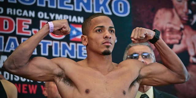 FILE - Puerto Rican boxer Felix Verdejo poses after his weigh-in at Madison Square Garden in New York, in this Friday, June 10, 2016, file photo.  (AP Photo/Bebeto Matthews, File)