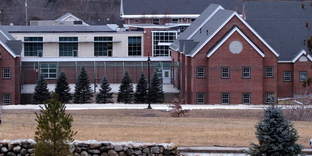 FILE - This Jan. 28, 2020, file photo shows the Sununu Youth Services Center in Manchester, N.H. Documents obtained by The Associated Press show a New Hampshire man now charged with holding down a teenage boy during a rape at the youth detention center had been fired years earlier. (AP Photo/Charles Krupa, File)