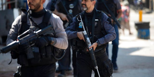 Police conduct an operation against alleged drug traffickers in the Jacarezinho favela of Rio de Janeiro, Brazil, Thursday, May 6, 2021.