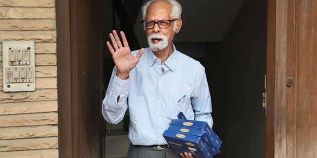 FILE - In this Nov. 8, 2020, file photo, Vice President Kamala Harris' maternal uncle, Balachandran Gopalan, talks to media outside his house, in New Delhi, India. (AP Photo/Manish Swarup, File)