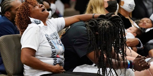 Family members react during the funeral for Andrew Brown Jr., Monday, May 3, 2021, at Fountain of Life Church in Elizabeth City, N.C. (AP Photo/Gerry Broome)
