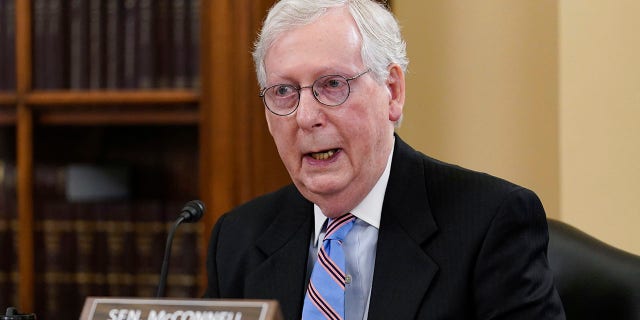 Senate Minority Leader Mitch McConnell, R-Ky., speaks at a Senate Rules Committee markup to argue against the "For the People Act," which would expand access to voting and other voting reforms, at the Capitol, May 11, 2021. 