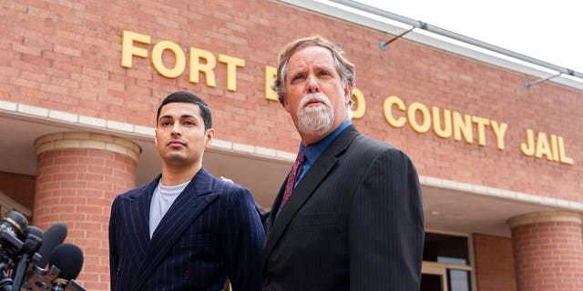 Victor Cuevas appears with his lawyer Michael Elliott after bonding out of jail, Wednesday, May 12, 2021, at the Fort Bend County Jail in Richmond, Texas. 