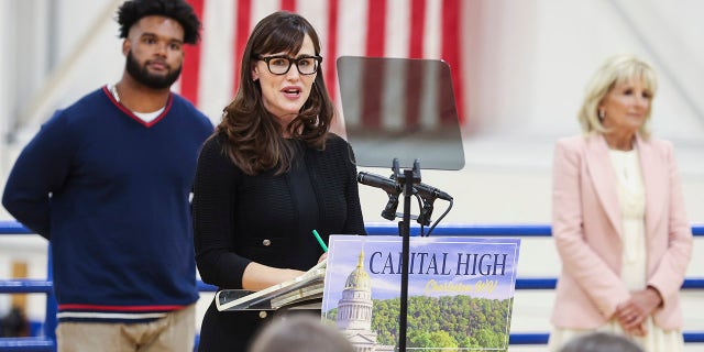 Actress Jennifer Garner speaks during a visit with first lady Jill Biden to a vaccination center at Capital High School in Charleston, W.Va., Thursday, May 13, 2021. (Oliver Contreras/The New York Times via AP, Pool)