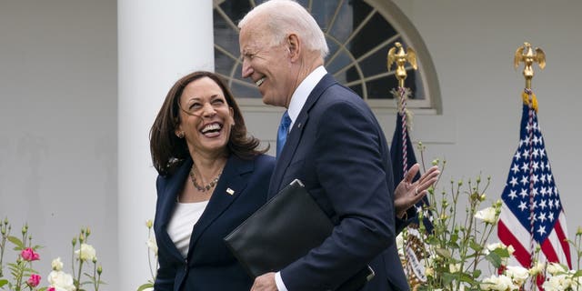 Vice President Kamala Harris and President Joe Biden after speaking about updated guidance on mask mandates, in the Rose Garden of the White House, Thursday, May 13, 2021, in Washington. (AP Photo/Evan Vucci)