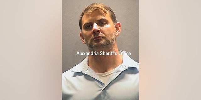 This file booking photo provided by the Alexandria, Va, Sheriff's Office, shows Peter Debbins. Debbins, a former Army Green Beret who admitted divulging military secrets to Russia over a 15-year period was sentenced to more than 15 years in prison Friday on espionage charges. (Alexandria Sheriff's Office via AP)