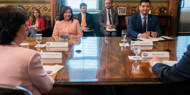 Clockwise from left, Rep. Norma Torres, D-Calif., Rep. Lucille Roybal-Allard, D-Calif., Congressional Hispanic Caucus (CHC) Chair Rep. Raul Ruiz, D-Calif., and Rep. Albio Sires, D- N.J., attend a meeting with Vice President Kamala Harris with the CHC, in her ceremonial office, Monday, May 17, 2021, on the White House complex in Washington. (AP Photo/Jacquelyn Martin)