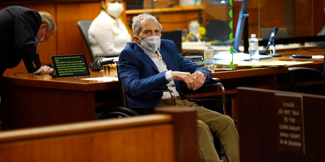 Robert Durst, in the middle, appears in court with his lawyer Dick DeGuerin, left, as Judge Mark E. Windham gives a final order to the judges before the lawyers begin opening cases in his murder trial.