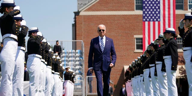 President Joe Biden arrives to speak at the commencement for the United States Coast Guard Academy in New London, Conn., Wednesday, May 19, 2021. (AP Photo/Andrew Harnik)
