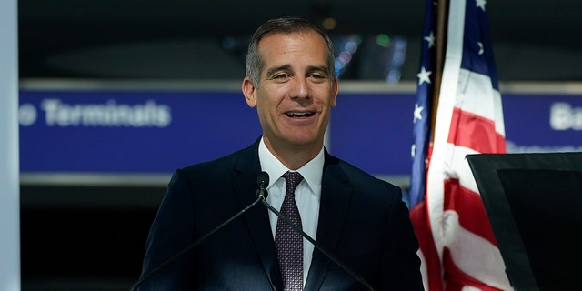 Los Angeles Mayor Eric Garcetti speaks a press conference at the new West Gates at Tom Bradley International Terminal at Los Angeles International Airport Monday, May 24, 2021, in Los Angeles. (AP Photo/Ashley Landis)