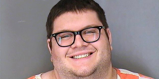 Roberto Silva Jr. is accused of killing two workers and wounding two others during a shooting at a Nebraska fast-food restaurant last fall, and now has been charged with stabbing a fellow jail inmate. (Sarpy County Jail via AP)