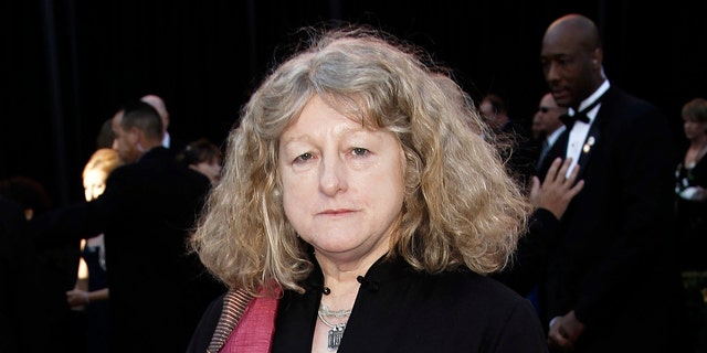 FILE - In this Feb. 27, 2011 file photo, costume designer Jenny Beavan arrives at the 83rd Academy Awards in the Hollywood section of Los Angeles. Beavan designed the costumes for the film "Cruella." (AP Photo/Matt Sayles, File)