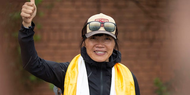 Tsang Yin-hung, 45, from Hong Kong, scaled Mount Everest from the base camp in 25 hours and 50 minutes and became the fastest female climber. (AP Photo/Bikram Rai)