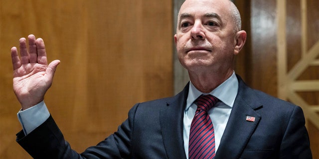 Homeland Security Secretary Alejandro Mayorkas is sworn in to testify before a Senate Homeland Security and Government Affairs Committee hearing on Capitol Hill, in Washington, Thursday, May 13, 2021.