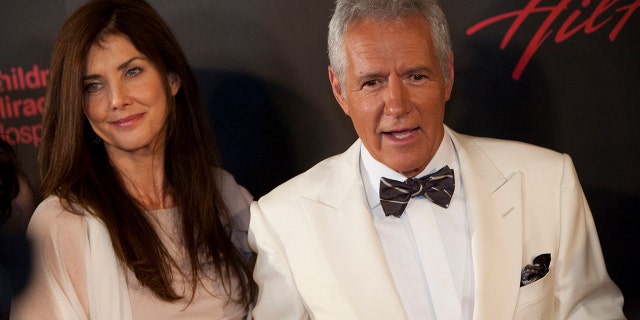 Actor Alex Trebek (R) and wife Jean Currivan Trebek arrive at the 38th Annual Daytime Emmy Awards show in Las Vegas, Nevada, on June 19, 2011. Alex Trebek died in November at the age of 80 after battling pancreatic cancer.
