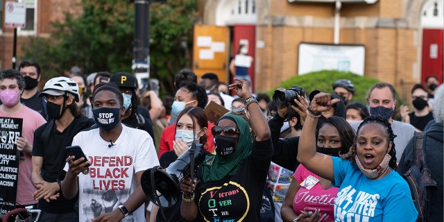 Community activist and congressional candidate Ameena Matthews, center, joins a protest of Chicago Mayor Lori Lightfoot near her home in the Logan Square neighborhood in Chicago, Illinois on May 20, 2021. (Photo by Max Herman/NurPhoto via Getty Images)