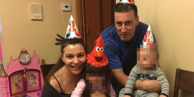 NYPD Highway Officer Anastasios Tsakos his wife, Irene, and their two children