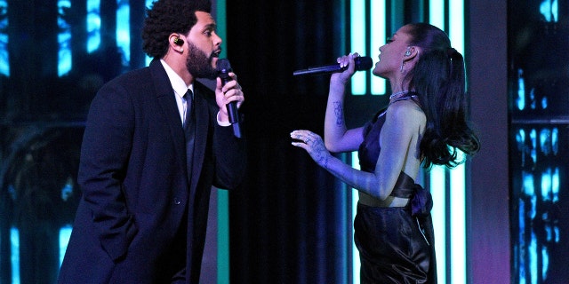 In this image released on May 27, The Weeknd and Ariana Grande perform onstage at the 2021 iHeartRadio Music Awards at The Dolby Theatre in Los Angeles, California, which was broadcast live on FOX on May 27, 2021.
