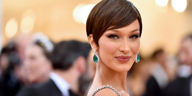 Bella Hadid said that during her early modeling days, she felt that she had to project an image of a ‘sexbot.’