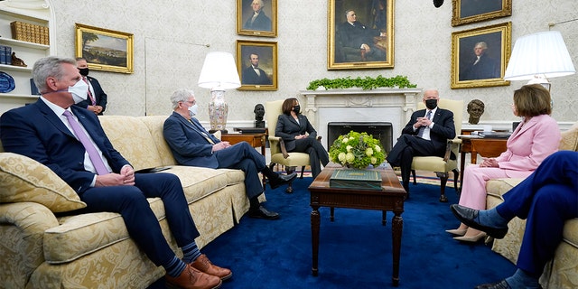 President Biden meets with congressional leaders in the Oval Office of the White House in 2021.